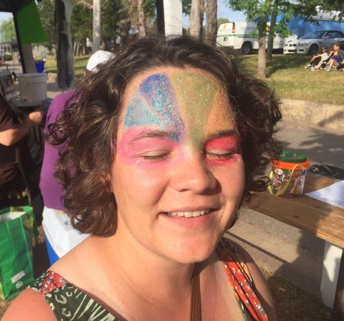 Rainbow and glitter is always the best face-paint option