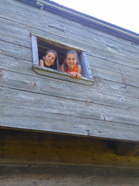 Peek-a-boo! Having fun at the Blockhouse. Photo credit: Ally Loiselle