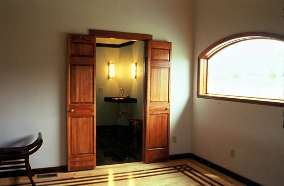 upstairs bedroom looking into the bathroom