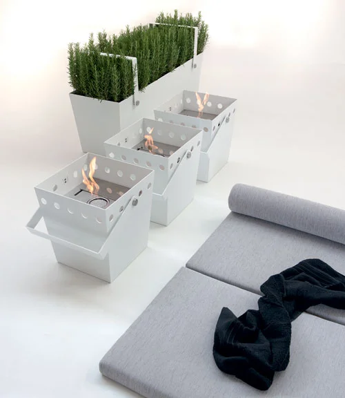 Earth and Fire If a new home spa is a bit out of your budget, check out this fabulous line of eco fuel fire buckets and plant pots. You can even move your indoor fire and garden with you around the house if you wish. 