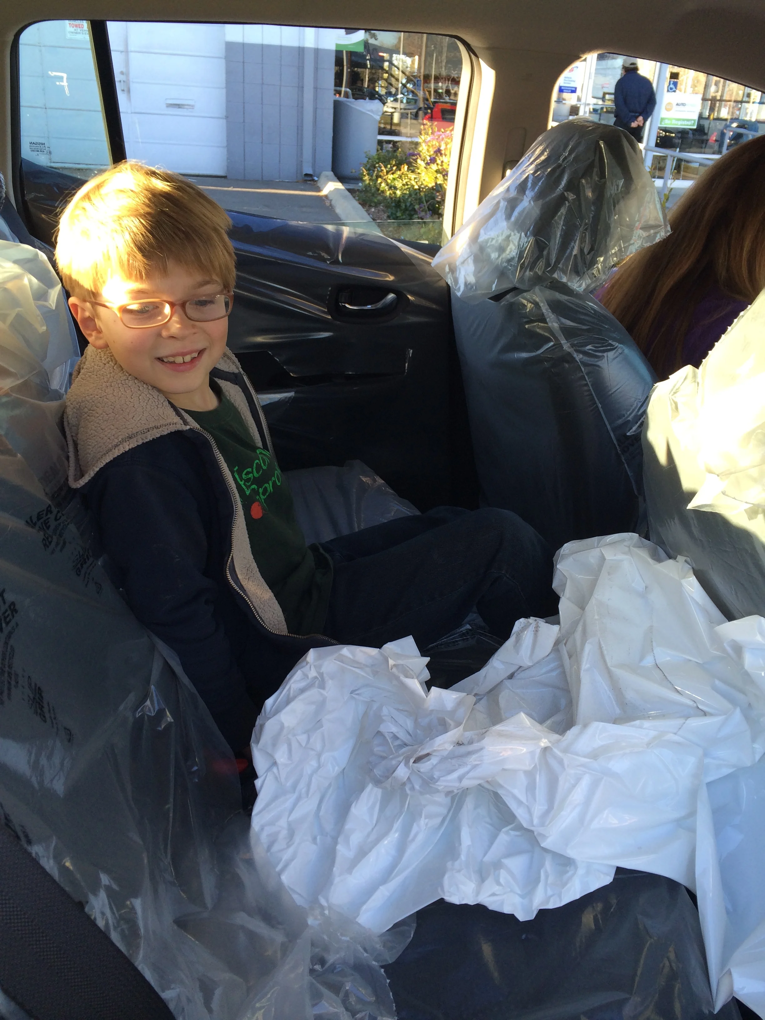 Elliot - high on that 'new car smell'.