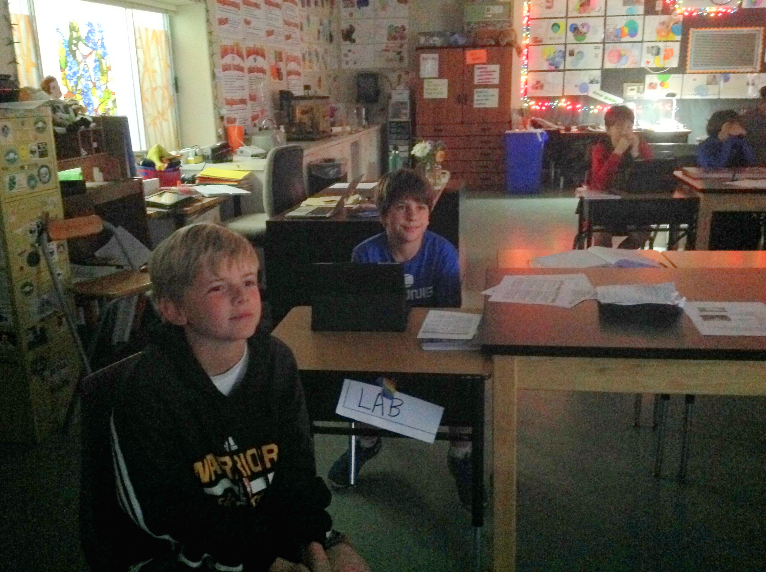Sixth grade science students watching Worse Than Poop!