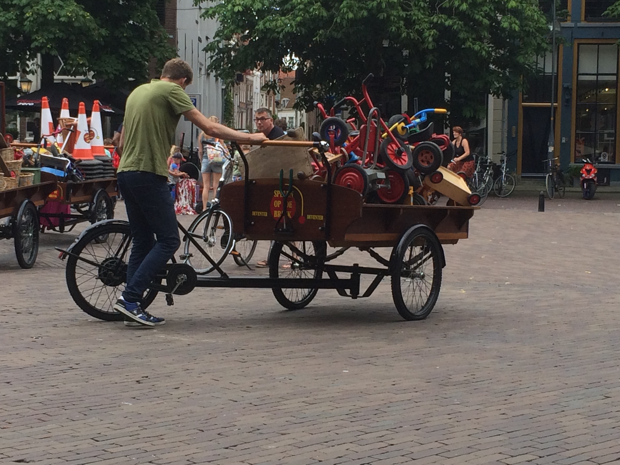 Traditional dutch toys delivered to the Deventer town square... via bicycle wagon, naturally.