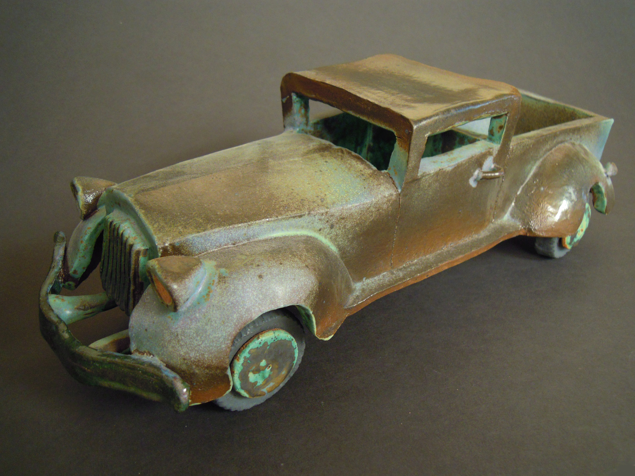  1930's Ford Truck, 2010. The first vehicle, glazed in Val Cushing green and blue. Feels like its been in the desert too long, perhaps it was in the kiln too long 