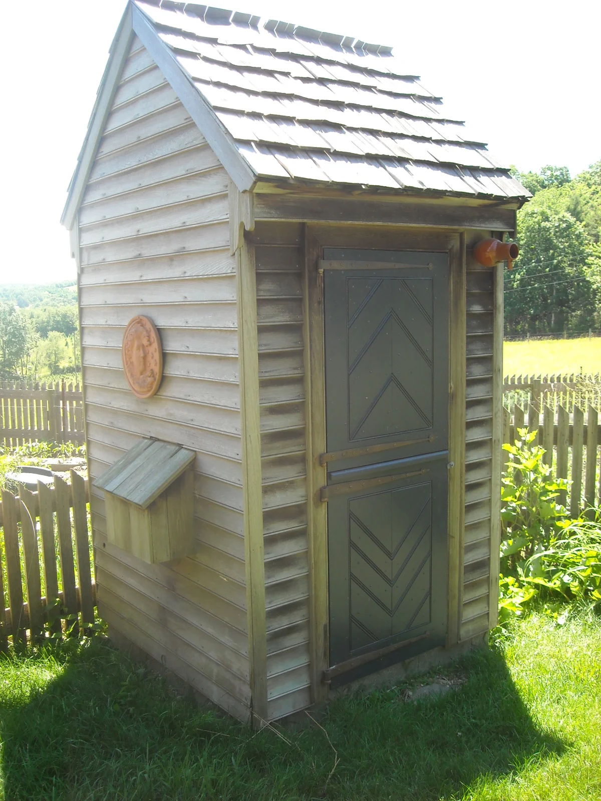 Outhouse converted to chicken coop