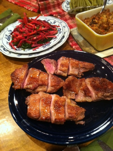 Salt and slice. Since there were only four of us at the table, we did not wait for the legs and thighs. The recipe recommends cutting them off the carcass and searing them too.