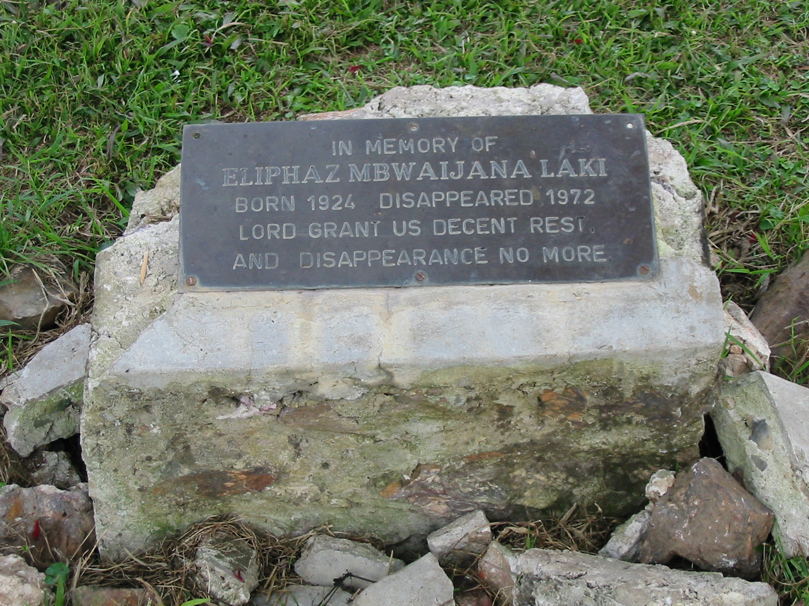  The memorial stone at the Laki family home in Ndeija (Andrew Rice) 