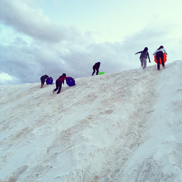 I was drawn to photograph these daredevils and they insisted I join them. If I wasn't Minnesotan to the core I would sing the praises of Sand Sledding from the rooftops! It was fabulous!