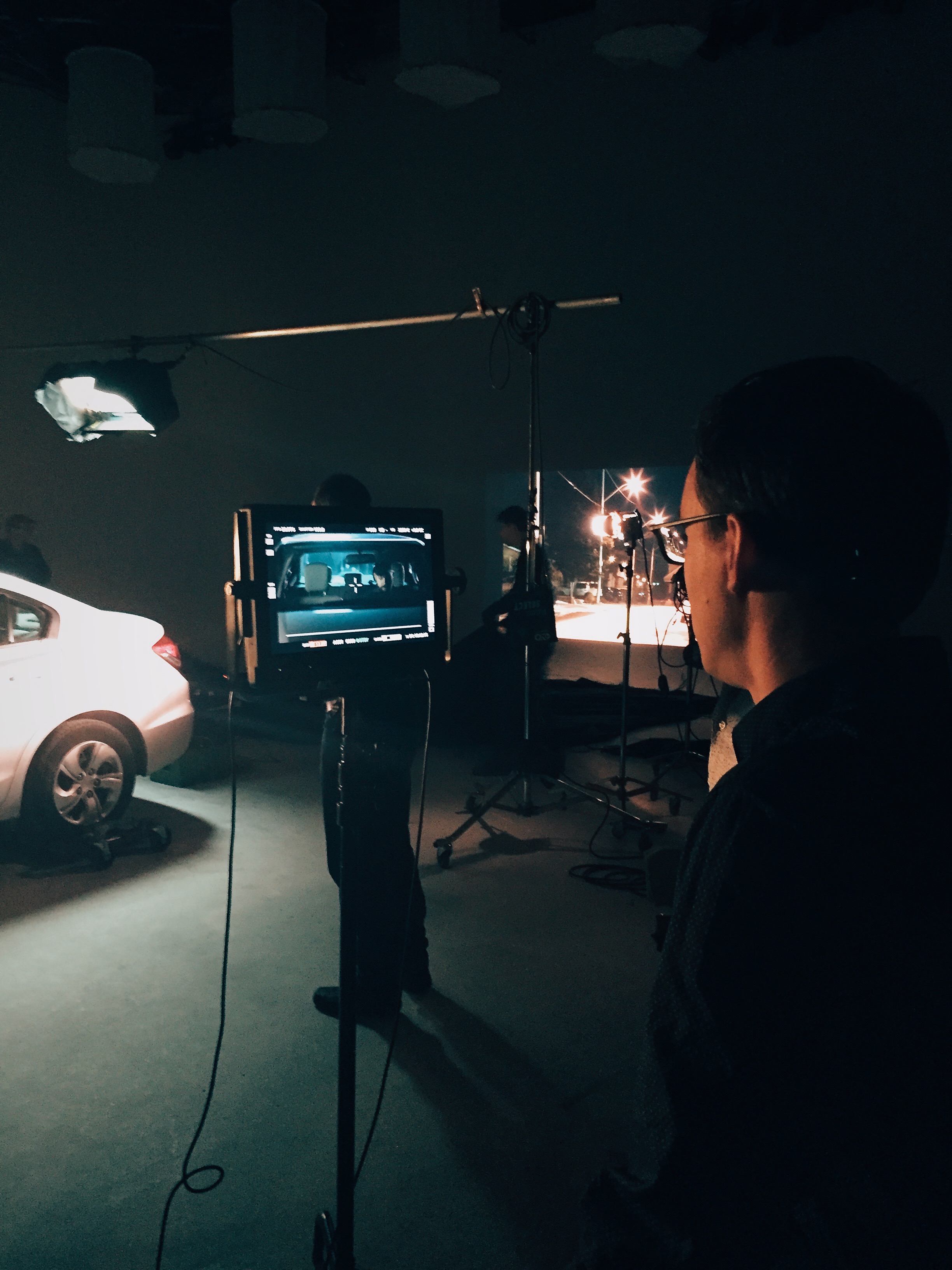 Behind the scenes of our first shoot featuring a full size car, front projection, and plenty of strategically placed lights