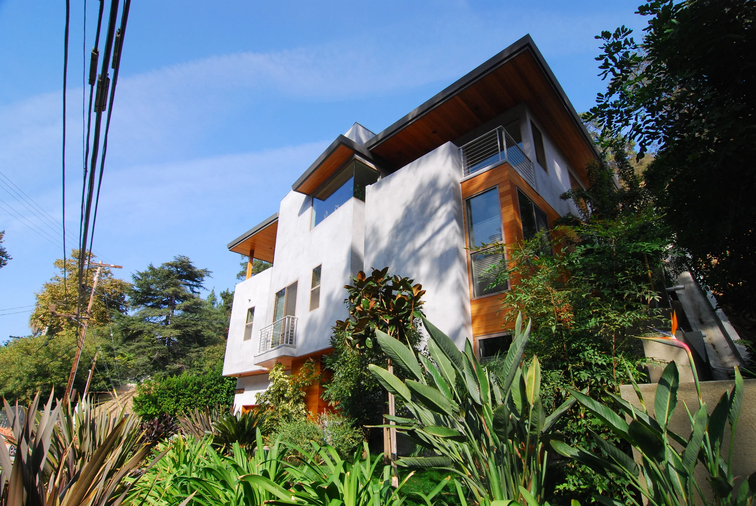  This high-end single family residence in Beverly Hills, California is located on a steep uphill site with the main frontage facing a local canyon street.&nbsp;  Given the proximity of this residence to the City Civic Center, the overall intent of th