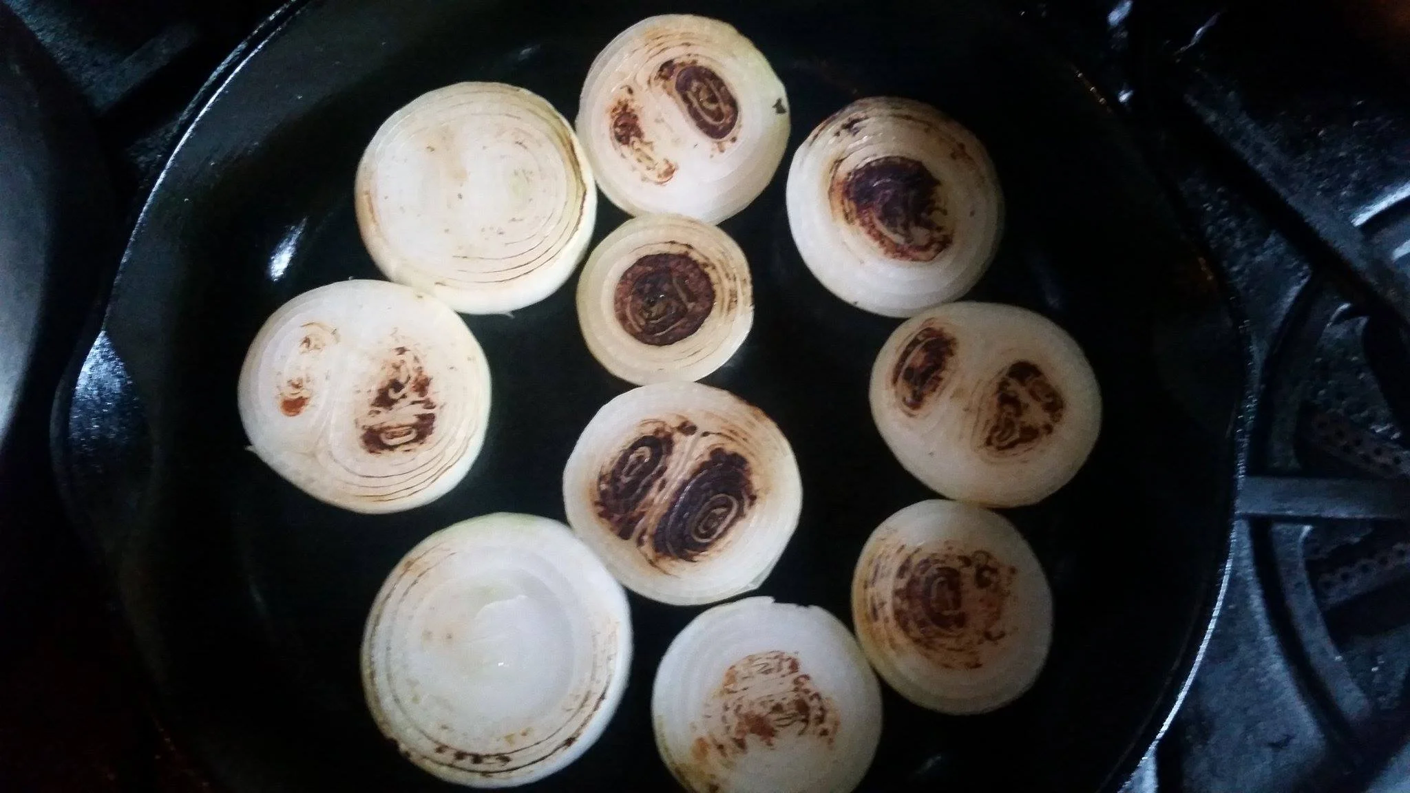 Charring onions in a cast iron pan
