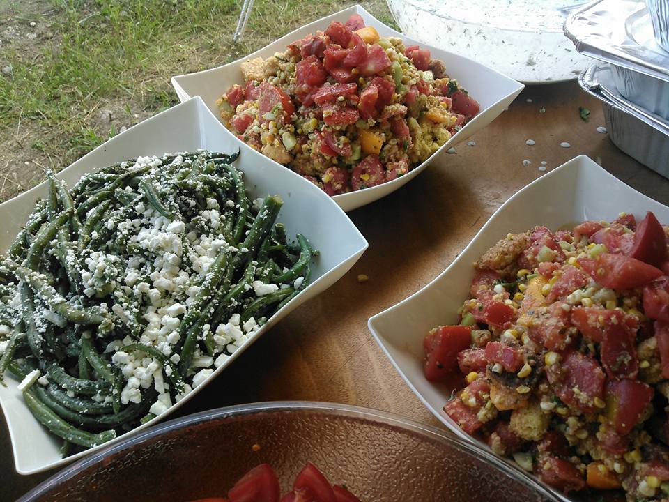 charred green beans with feta, lemon, and oregano; cornbread panzanella