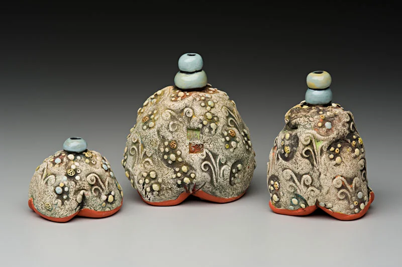 Three Bumpy Bottles