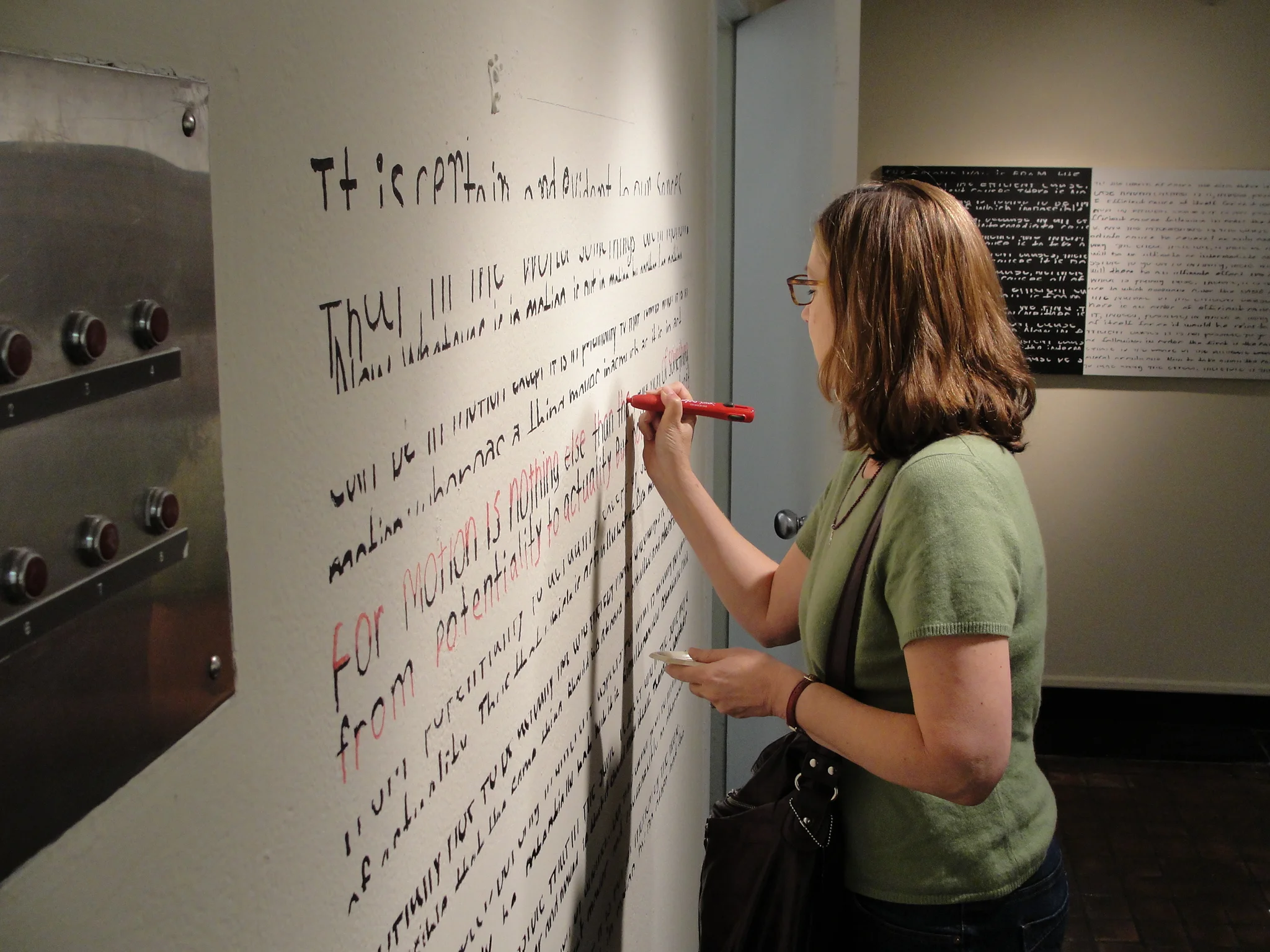   Gallery visitor interacts with  Quinque viae (Proof 1)  during opening reception in Salve Regina Gallery; November 2010.  
