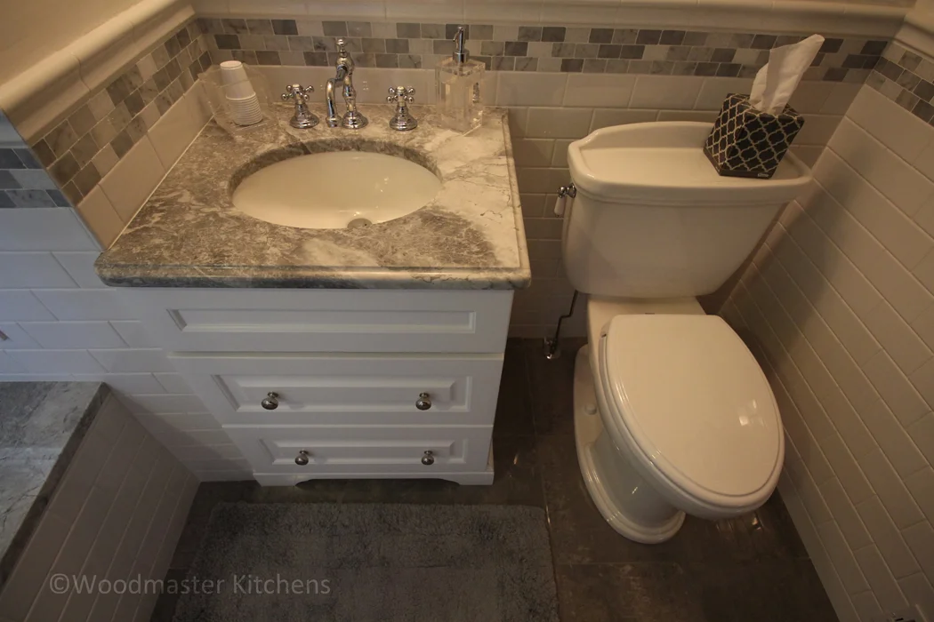 Bathroom design with oval sink.