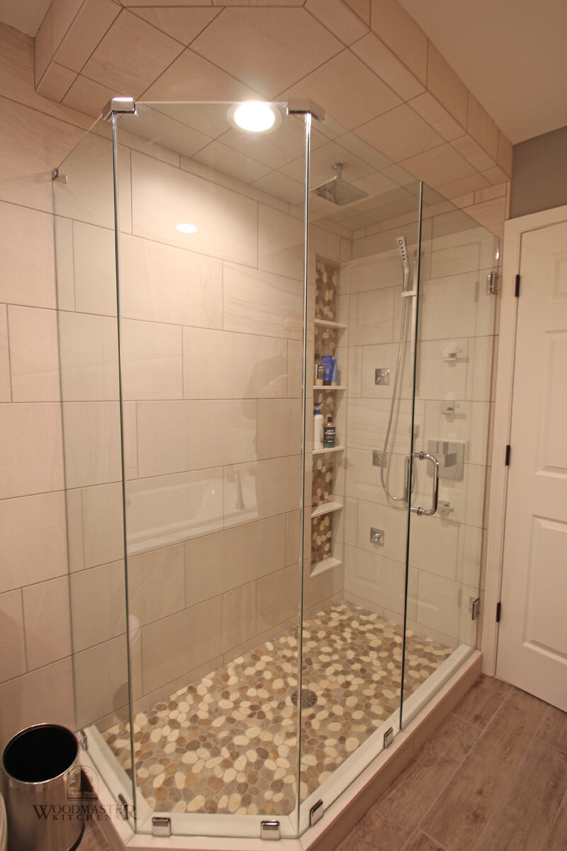 Storage Solutions in the Shower - Select Kitchen and Bath