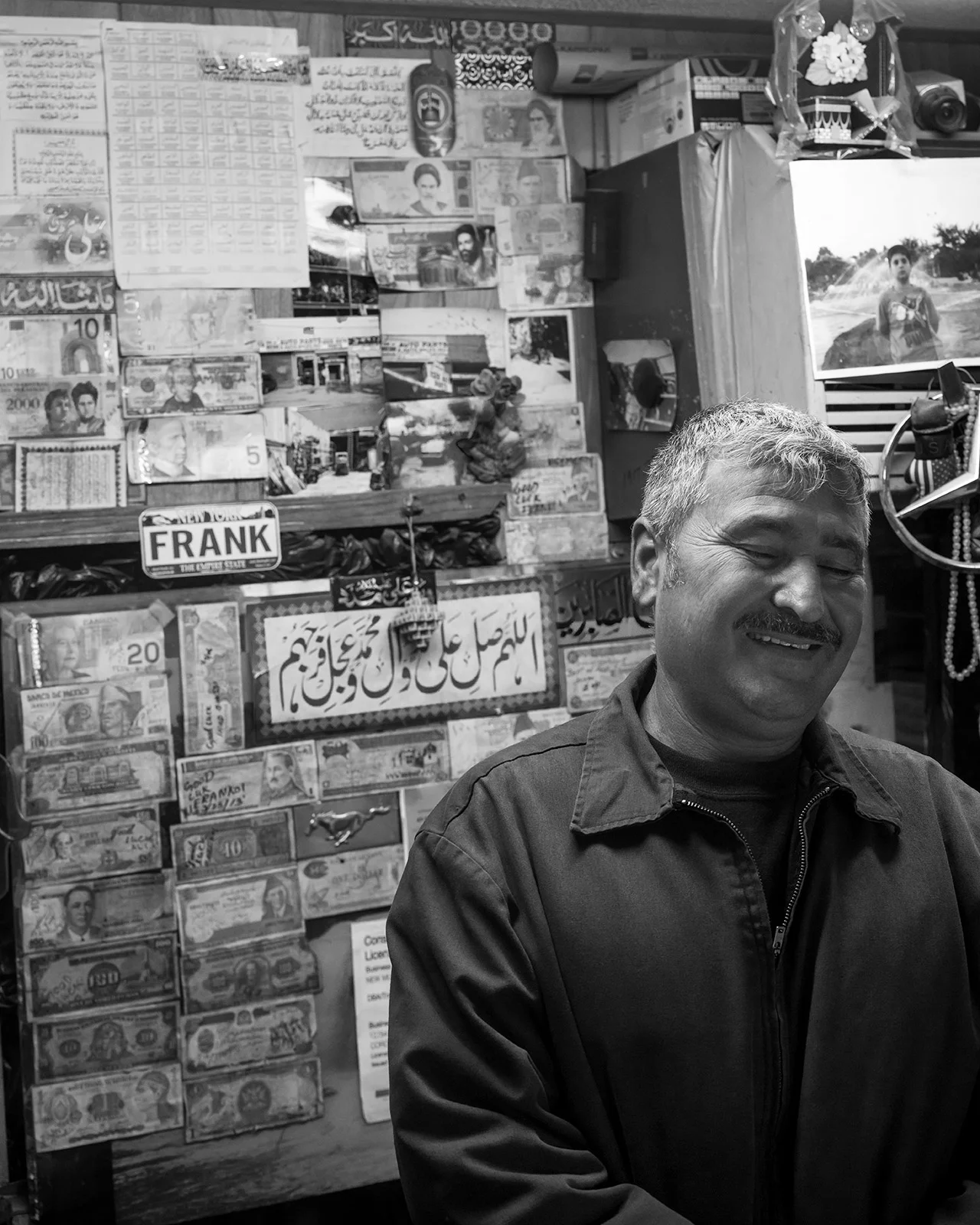 Ali in his office. Frank was his brother and was the one to put the money from all over the world on the wall. Sort of a shrine for him.