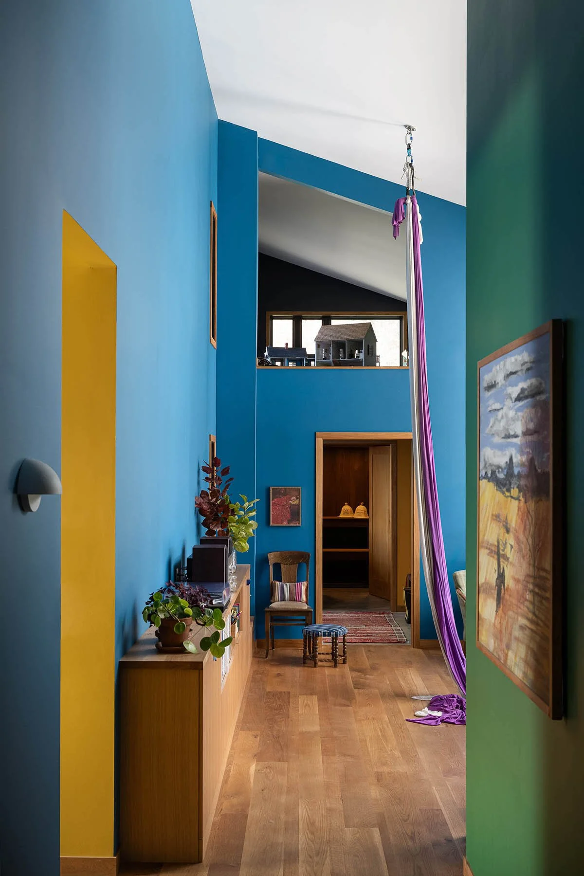 rainbow-in-the-woods-susan-yeley-colorful-walls-hallways-2nd-level.jpg