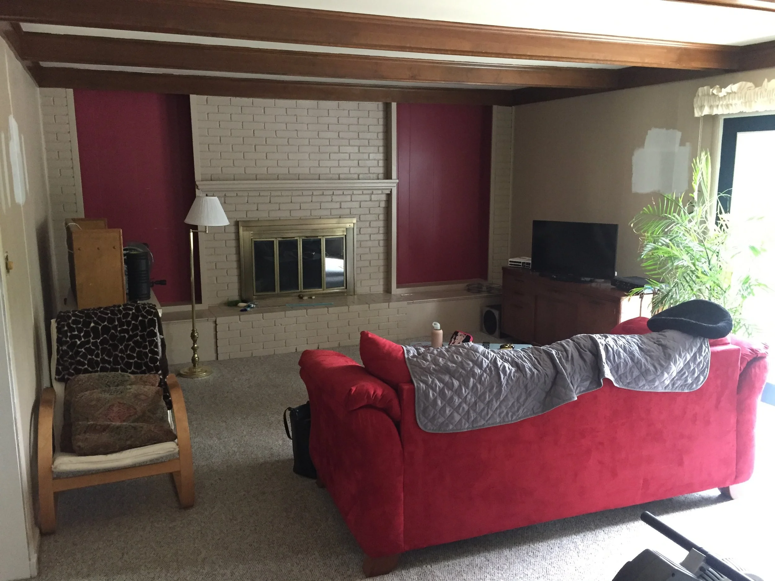  Before of the family room. Traditional lower level family room in a split-level. 