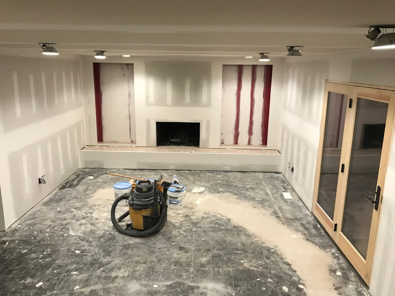  In progress. Fireplace wall facelift in progress. 