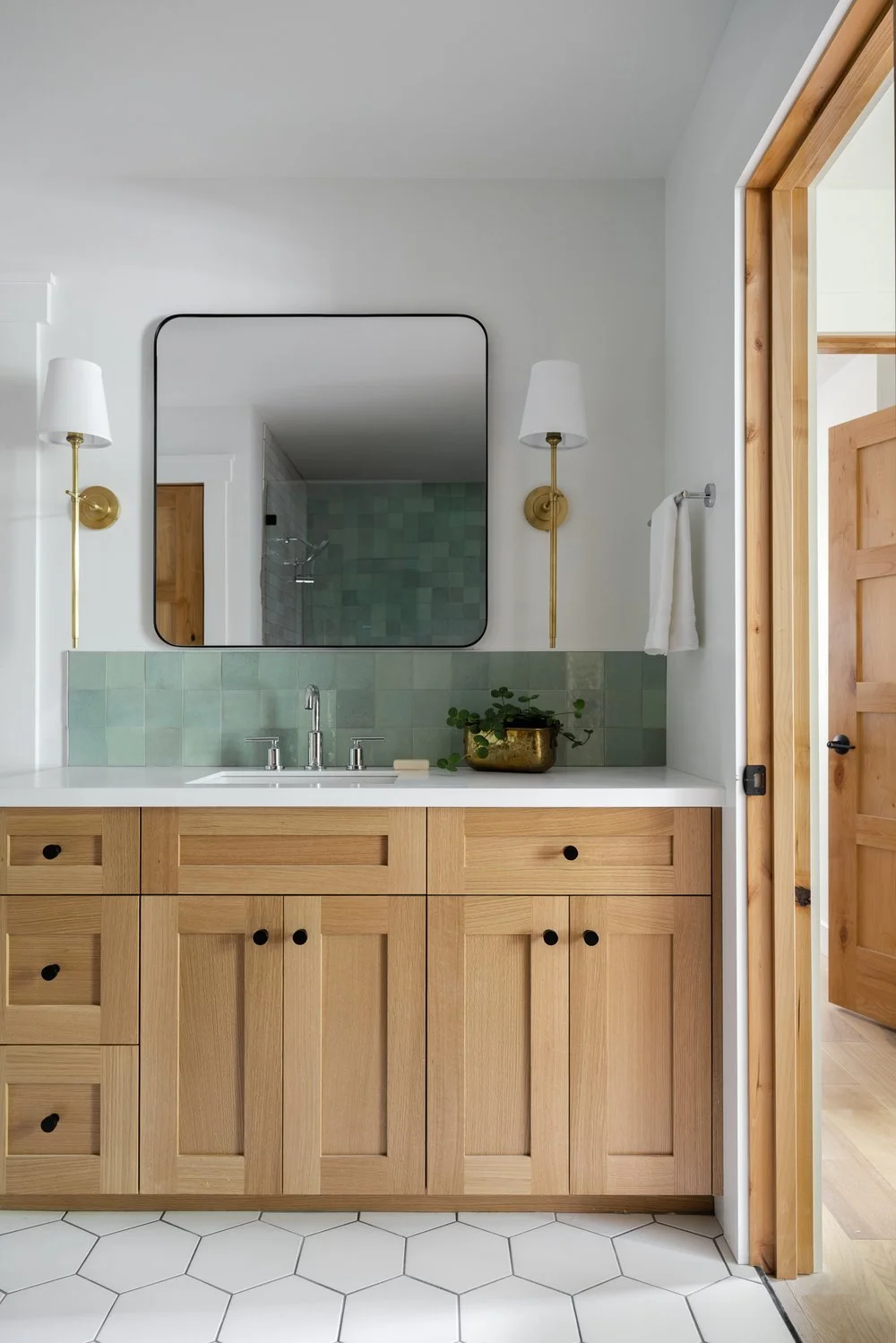 a-frame-lake-retreat-green-tile-vanity-bathroom.jpg