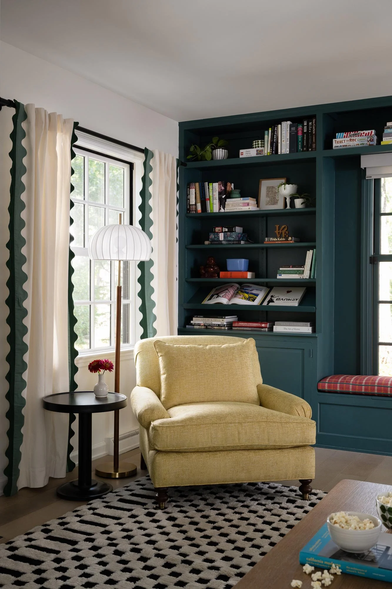 off-campus-canvas-checkered-rug-yellow-chair.jpg