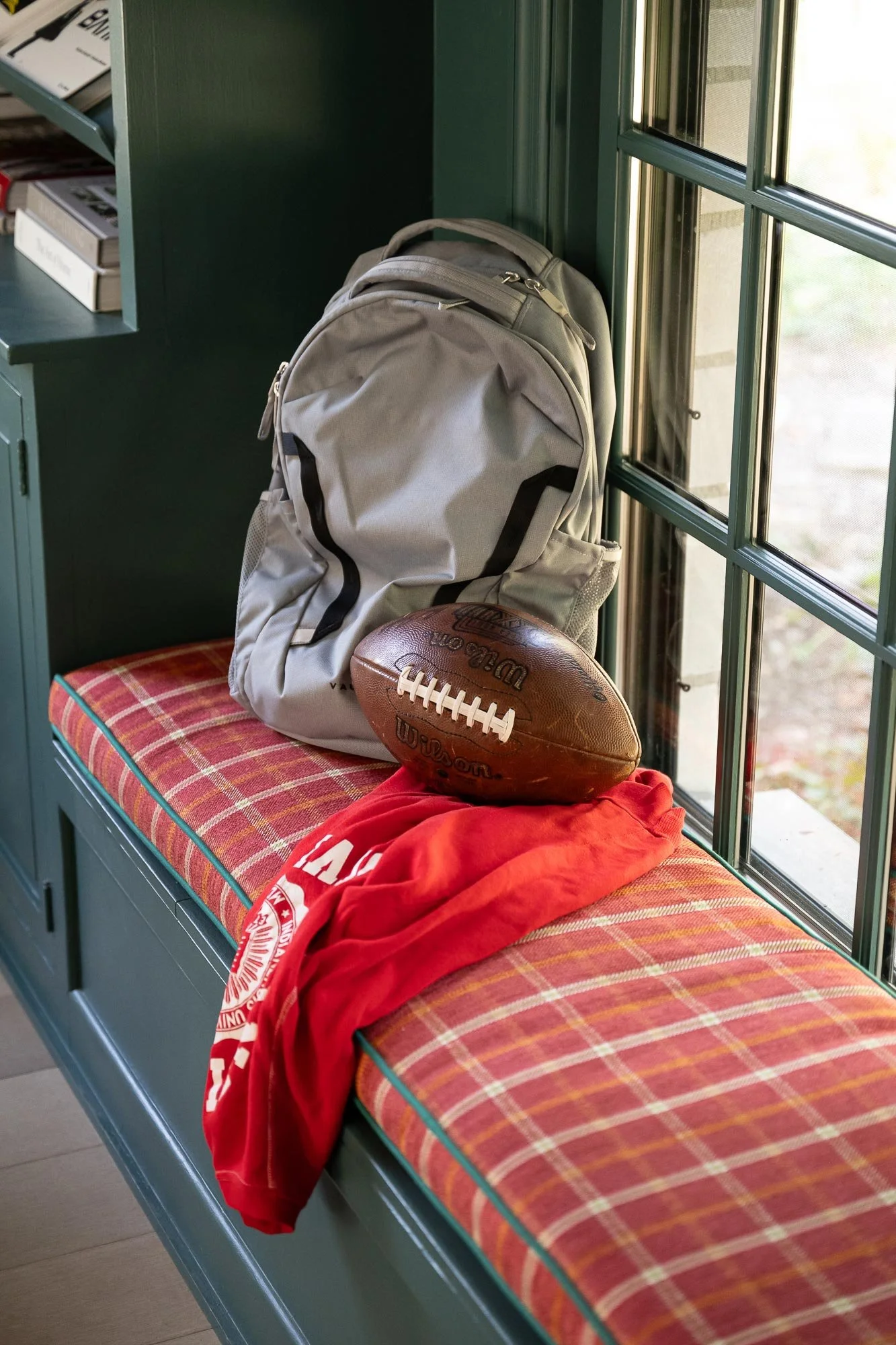 off-campus-canvas-bookshelves-styled-football.jpg