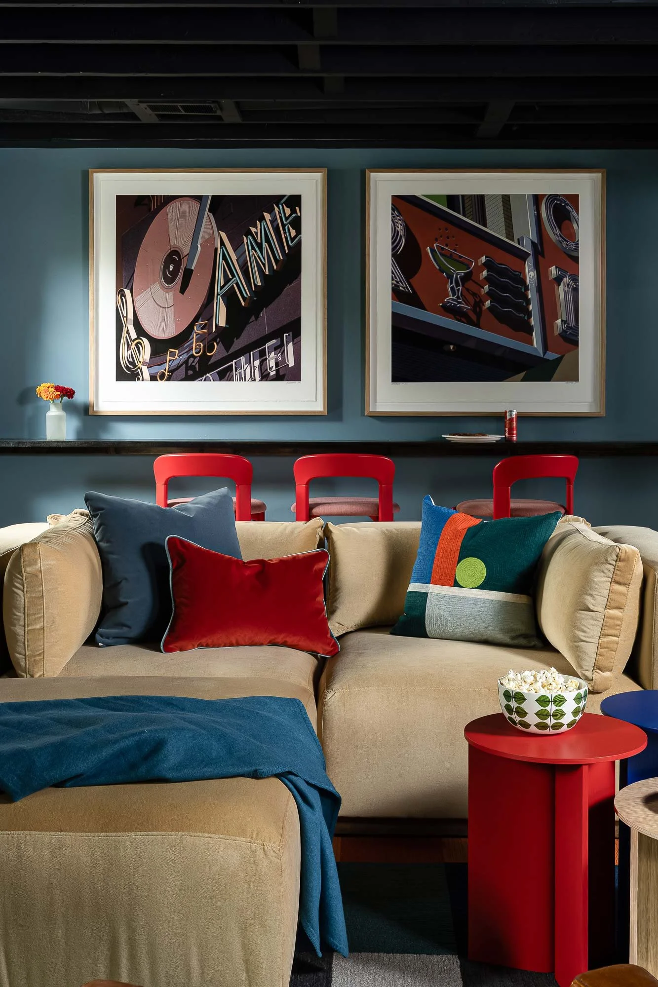 off-campus-canvas-basement-sofa-red-barstool-popcorn.jpg