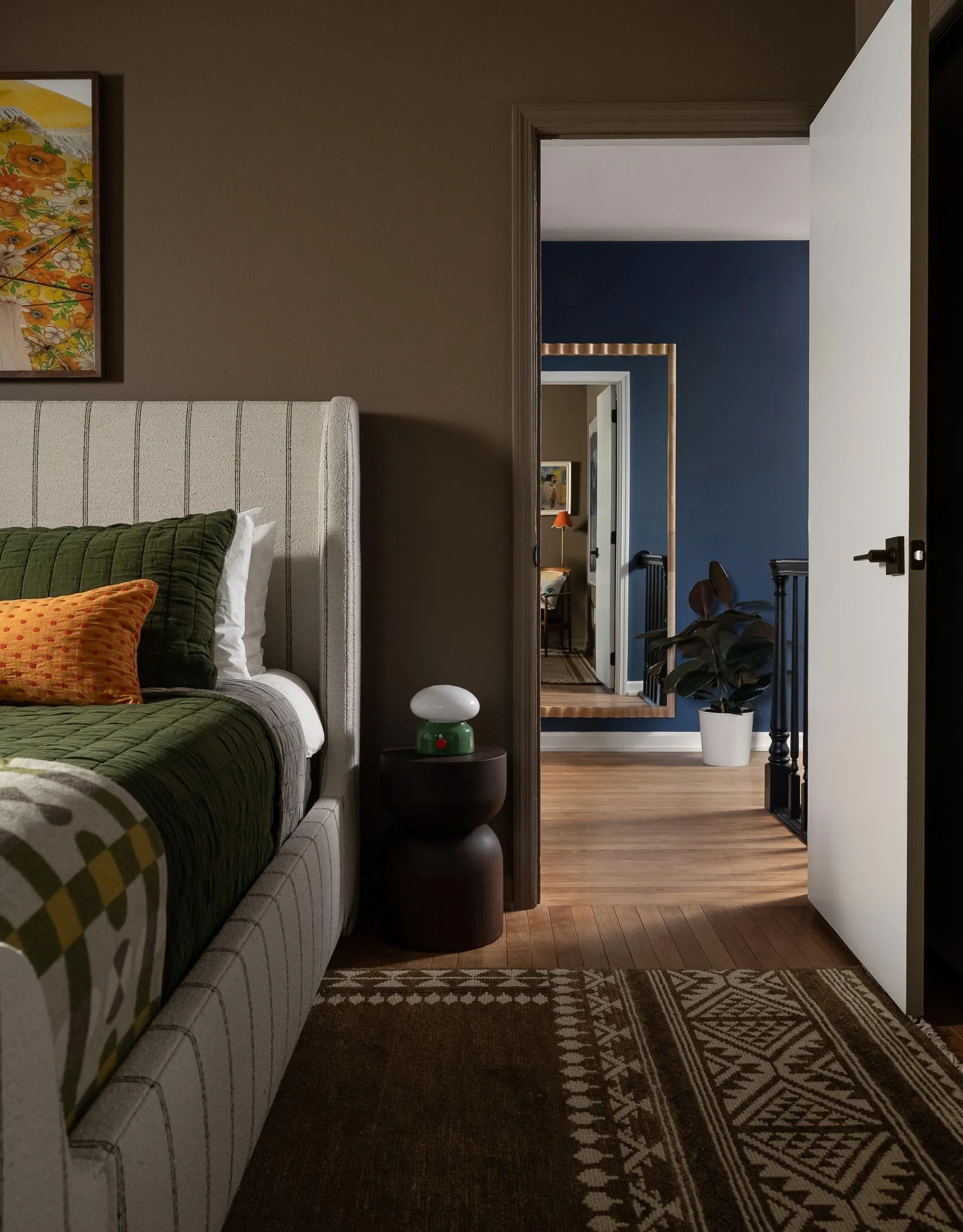 off-campus-canvas-primary-bedroom-bed-doorway.jpg
