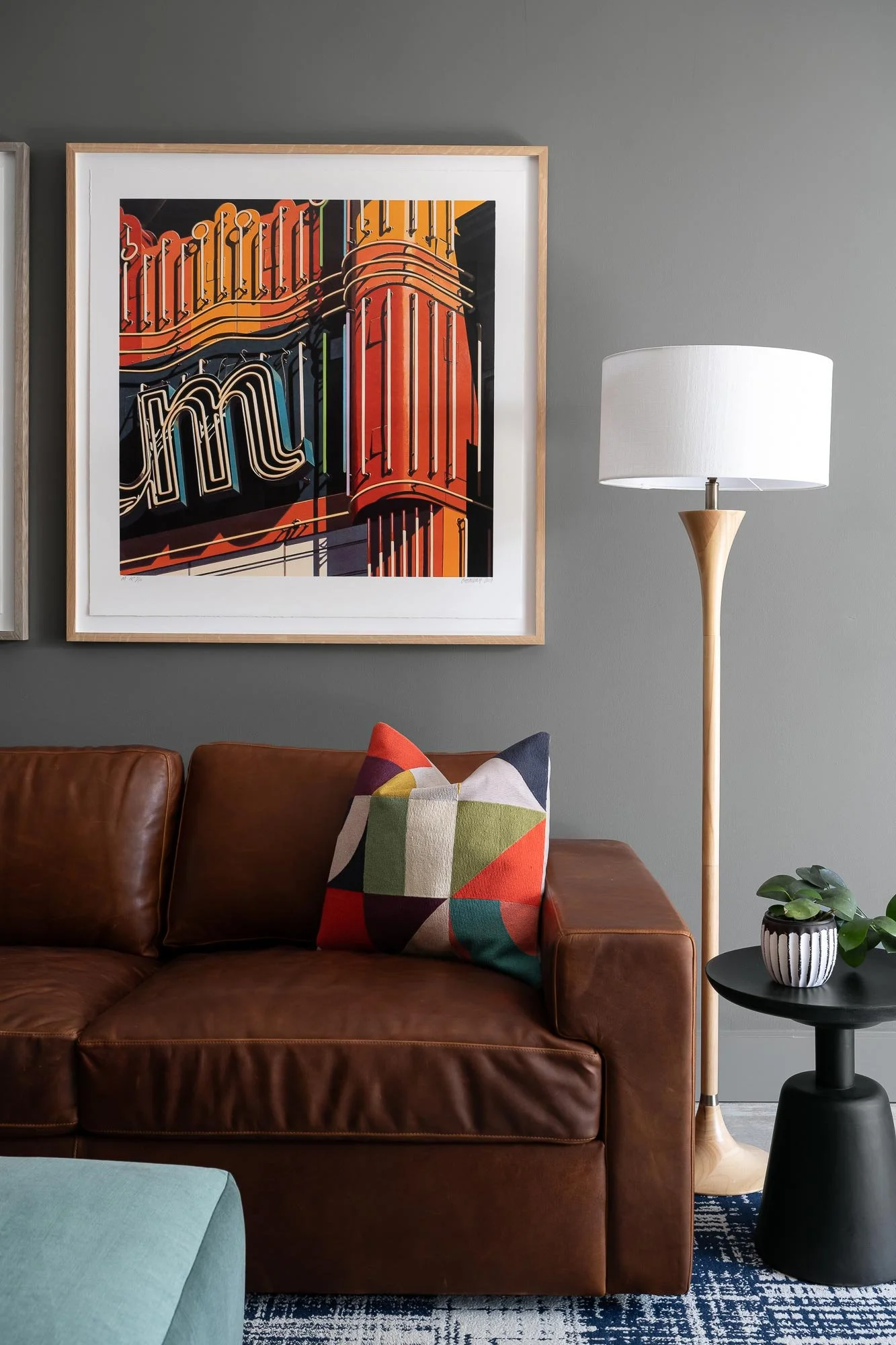 off-campus-canvas-leather-sofa-lamp-framed-artwork.jpg