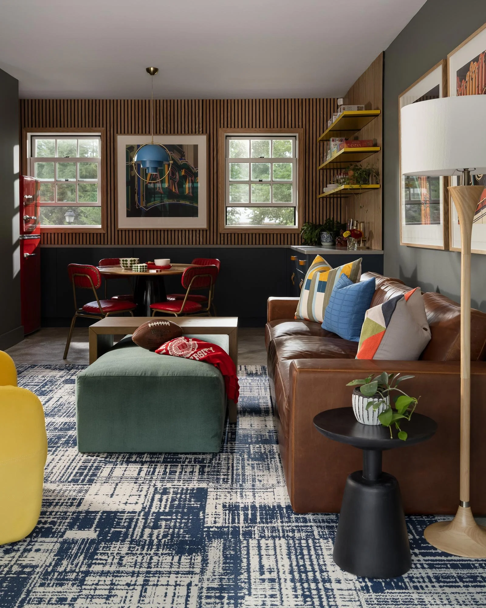 off-campus-canvas-football-watchroom-wood-paneling-tv.jpg
