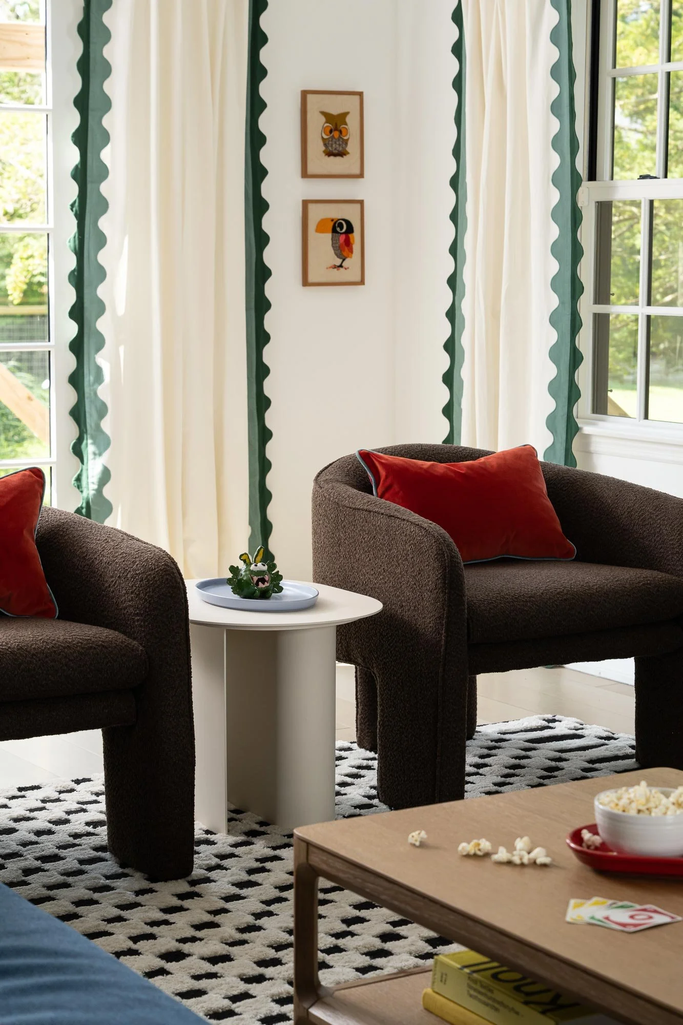 off-campus-canvas-living-room-chairs-cozy-rug-curtains.jpg