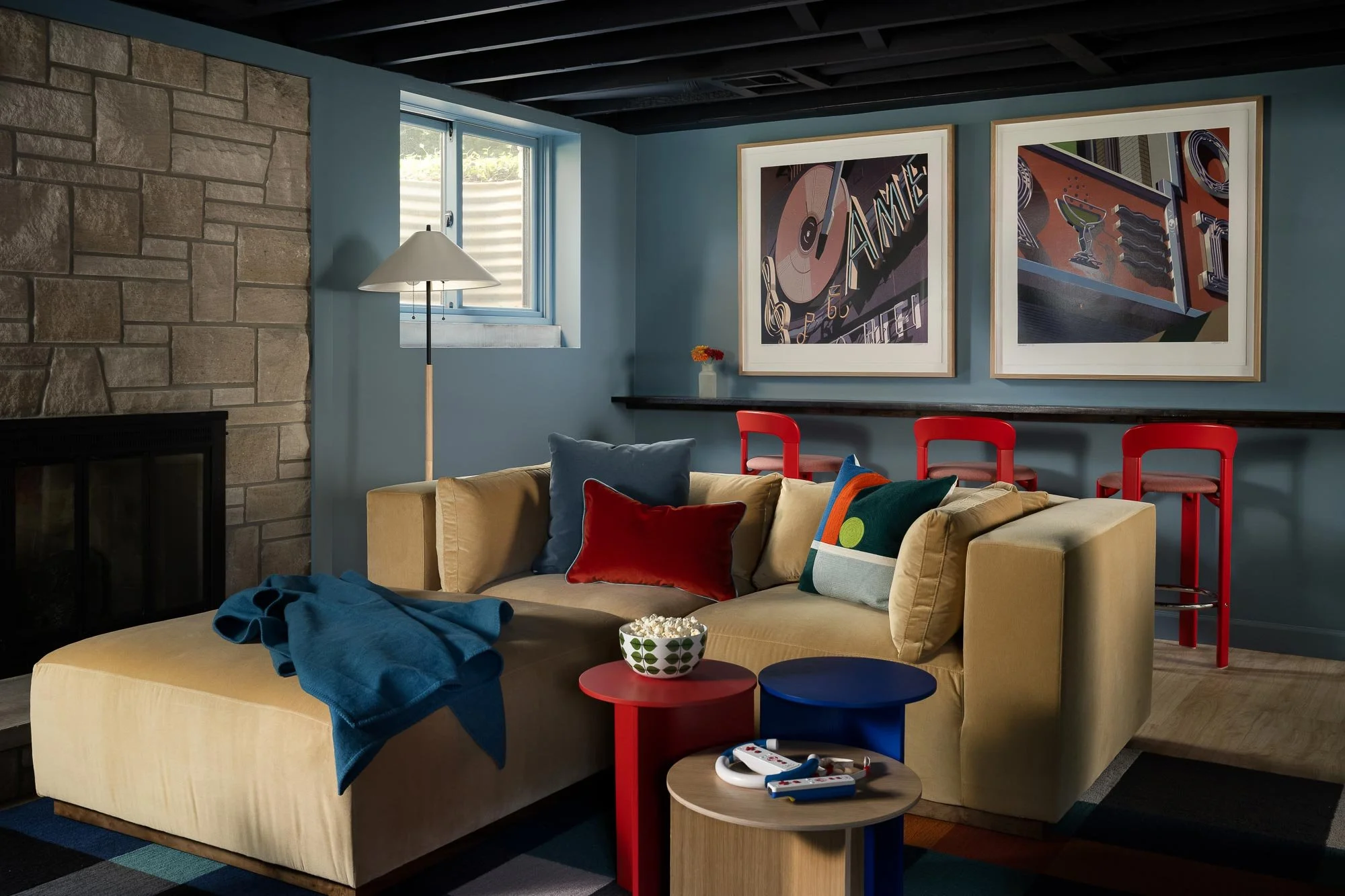 off-campus-canvas-basement-sofa-window-art-barstools.jpg