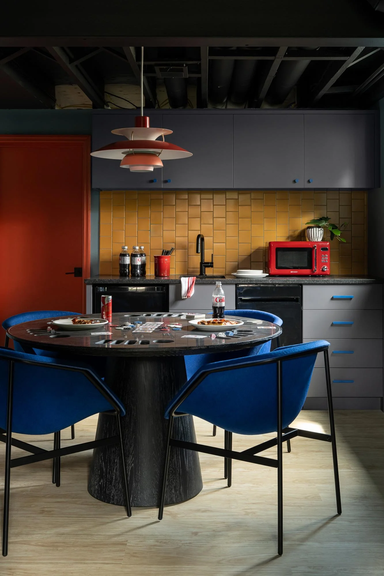 off-campus-canvas-basement-kitchen-yellow-tile-poker-table.jpg
