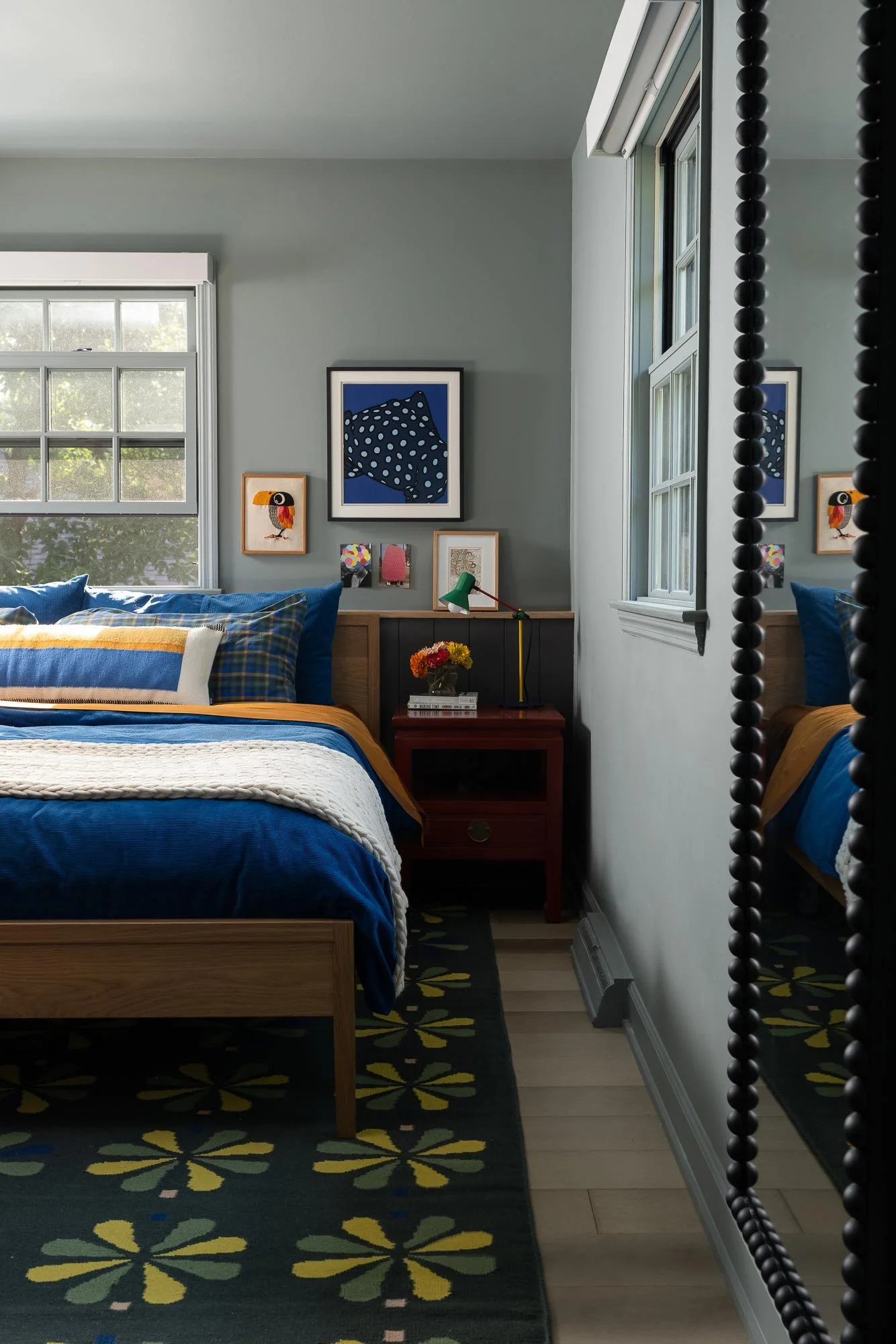 off-campus-canvas-bedroom-blue-nightstand-bedside-patterned-rug.jpg