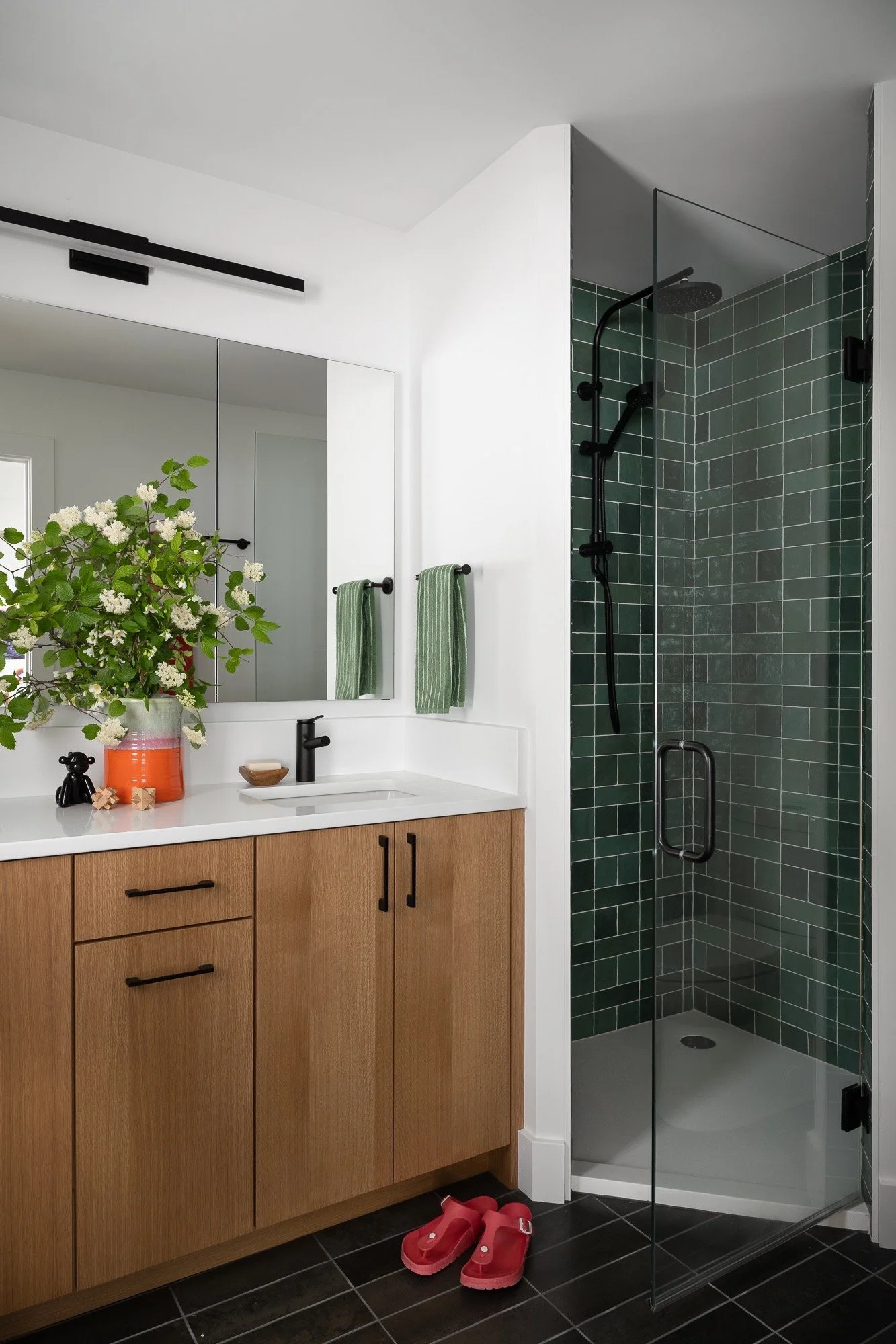 bathroom-vanity-green-tile-shower-oak-cabinetry-contemporary-interior-design-bloomington.jpg