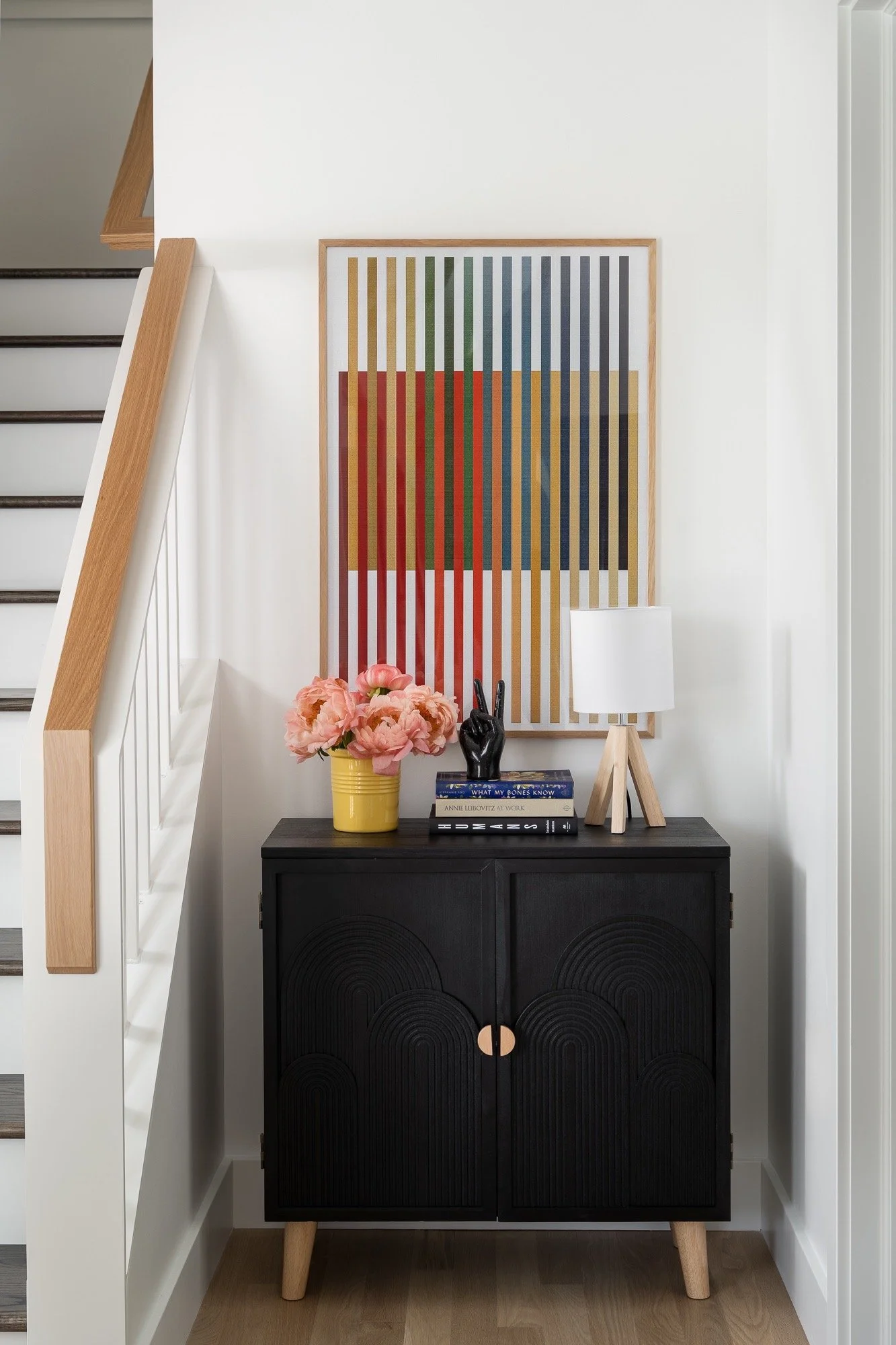 foyer-console-table-colorful-artwork-modern-farmhouse-staircase-indiana-interior-design.jpg