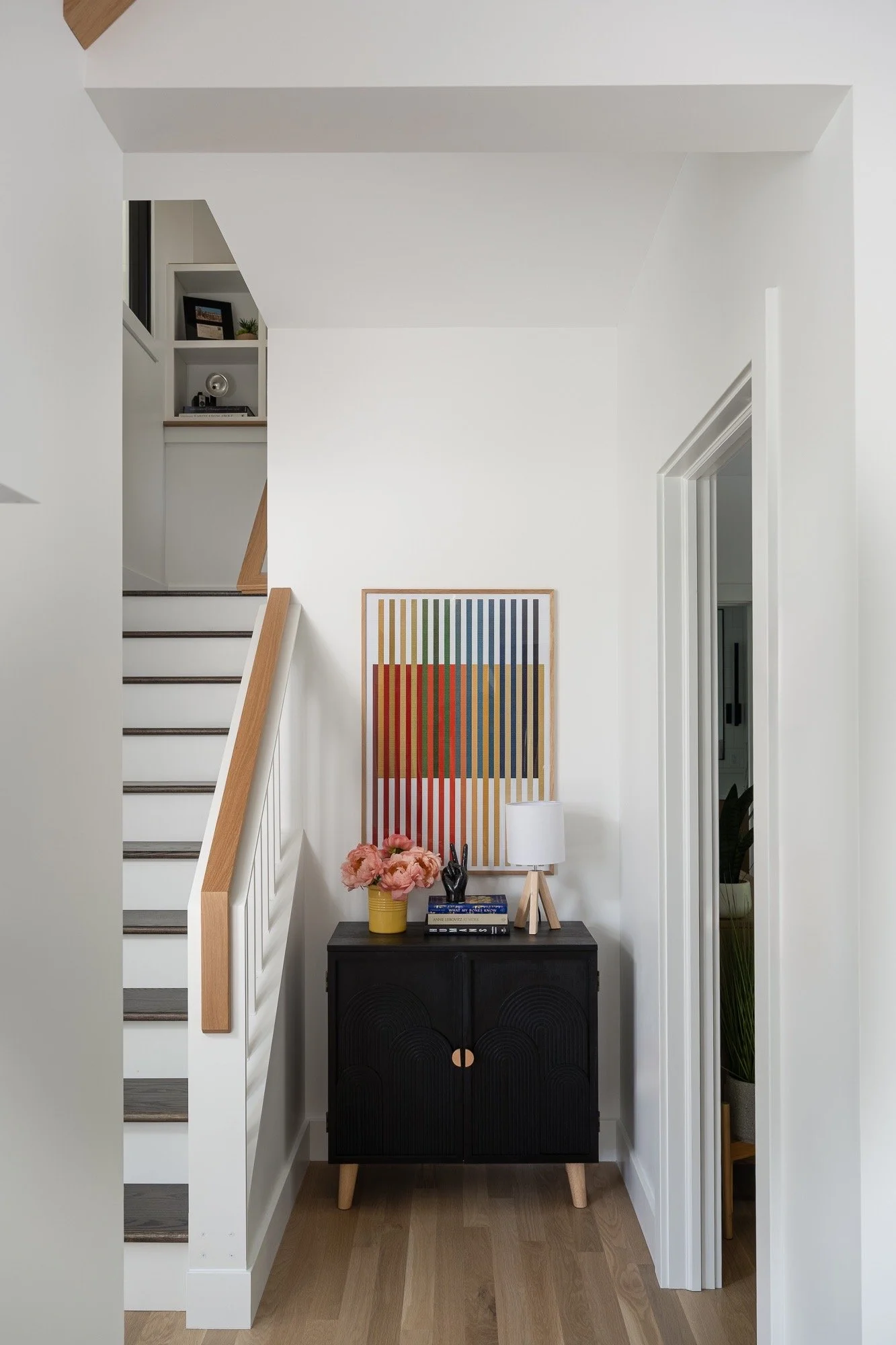 foyer-entry-staircase-colorful-artwork-modern-interior-design-bloomington-indiana.jpg