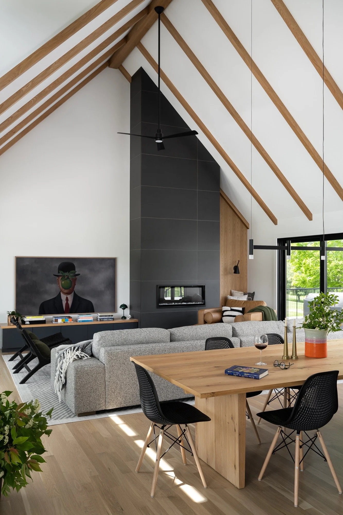 open-concept-living-dining-vaulted-ceiling-exposed-beams-contemporary-interior-design-bloomington.jpg