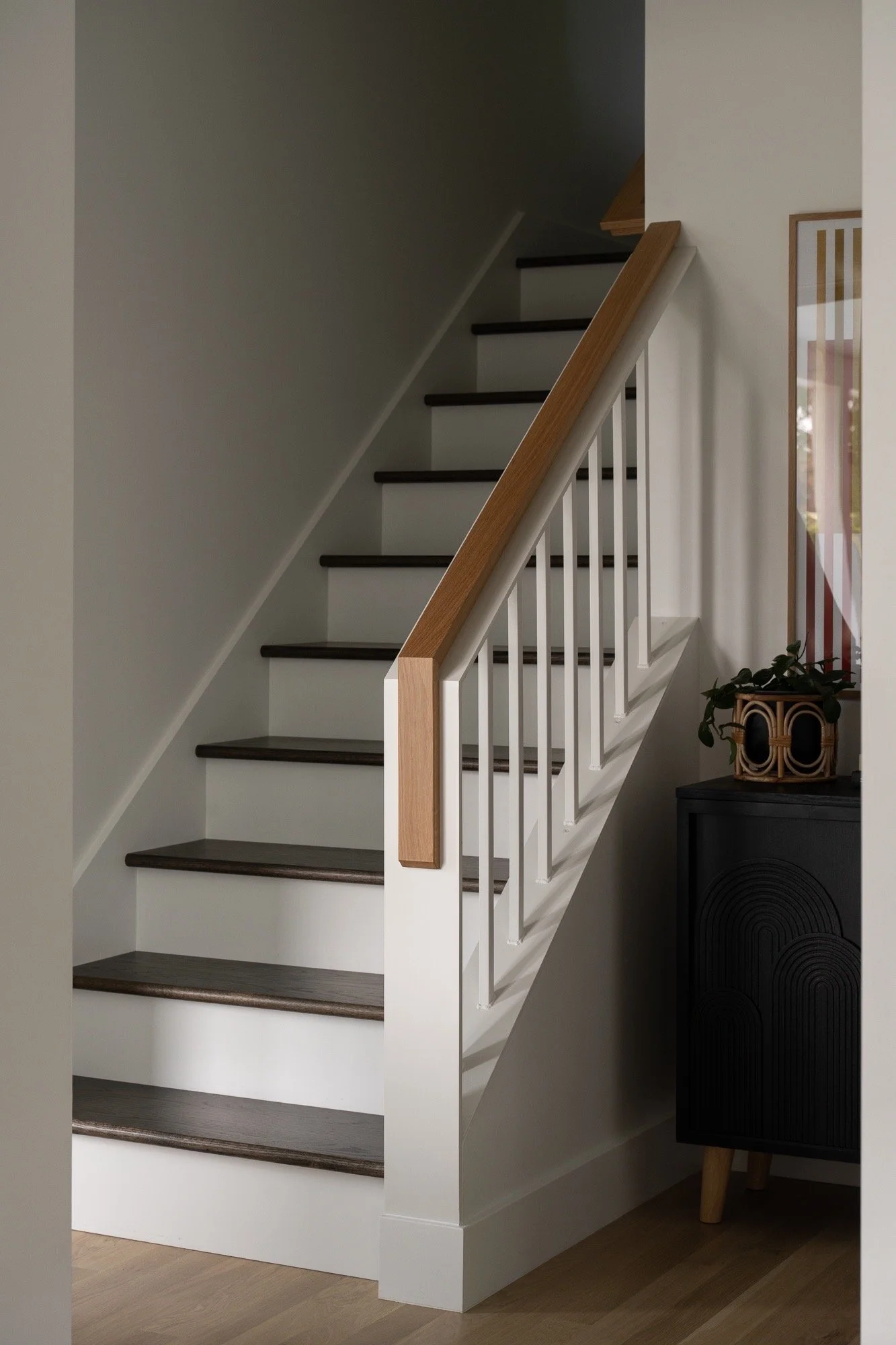 staircase-wood-handrail-white-spindles-modern-farmhouse-interior-design-indiana.jpg