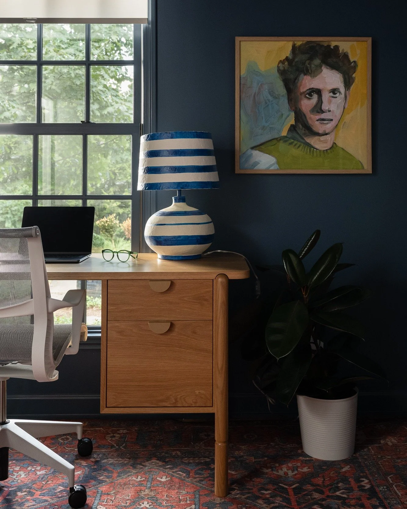 Like a basement, we say an office has to work extra hard to compel you to be there. This one, in #offcampuscanvas, is color-drenched and art-filled, with a desk perfectly situated in front of the window. If you have to get through the task-list, gift