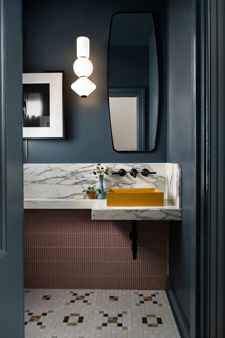 a-good-vintage-bathroom-blue-sink-doorway-view.jpg
