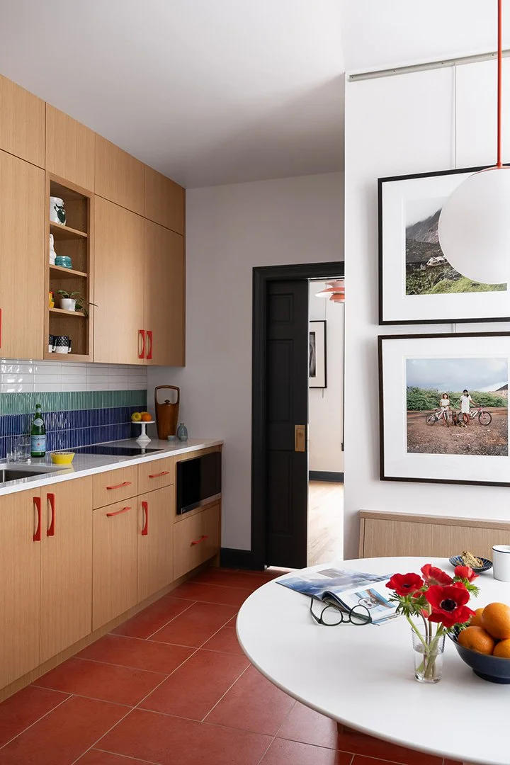 a-good-vintage-kitchen-oak-cabinets-red-handles-blue-tile.jpg