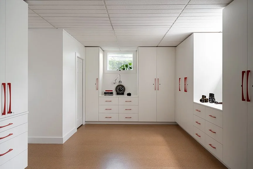 a-good-vintage-storage-custom-cabinetry-with-clocks-cameras.jpg