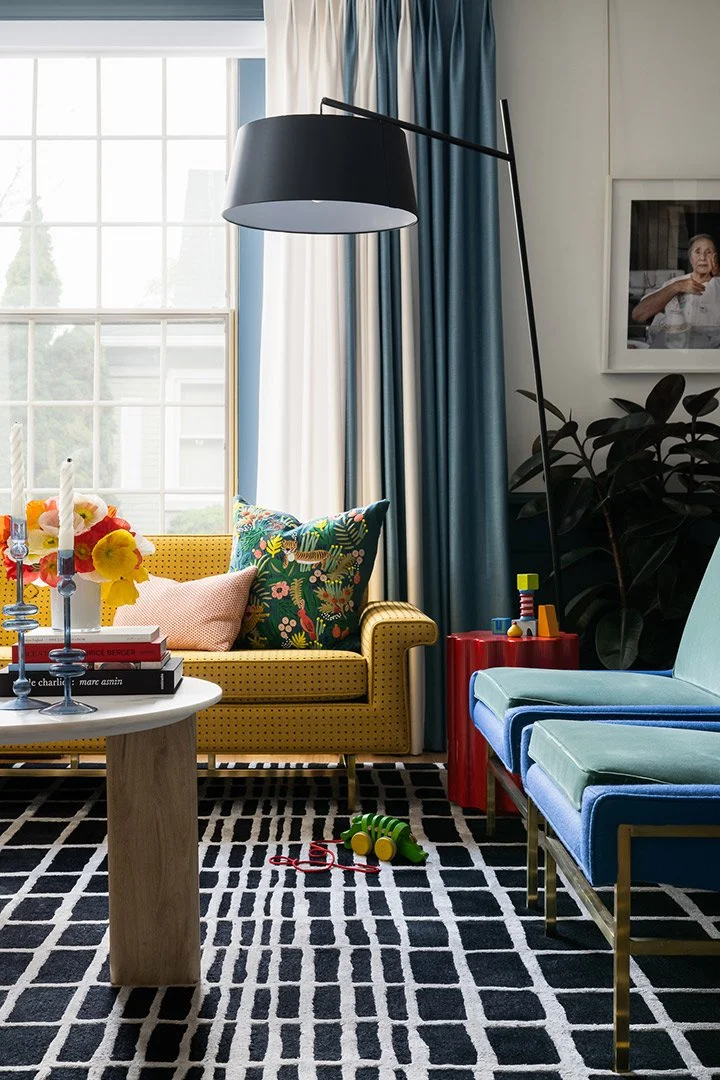 a-good-vintage-living-space-sofa-pillows-rug-light-fixture.jpg