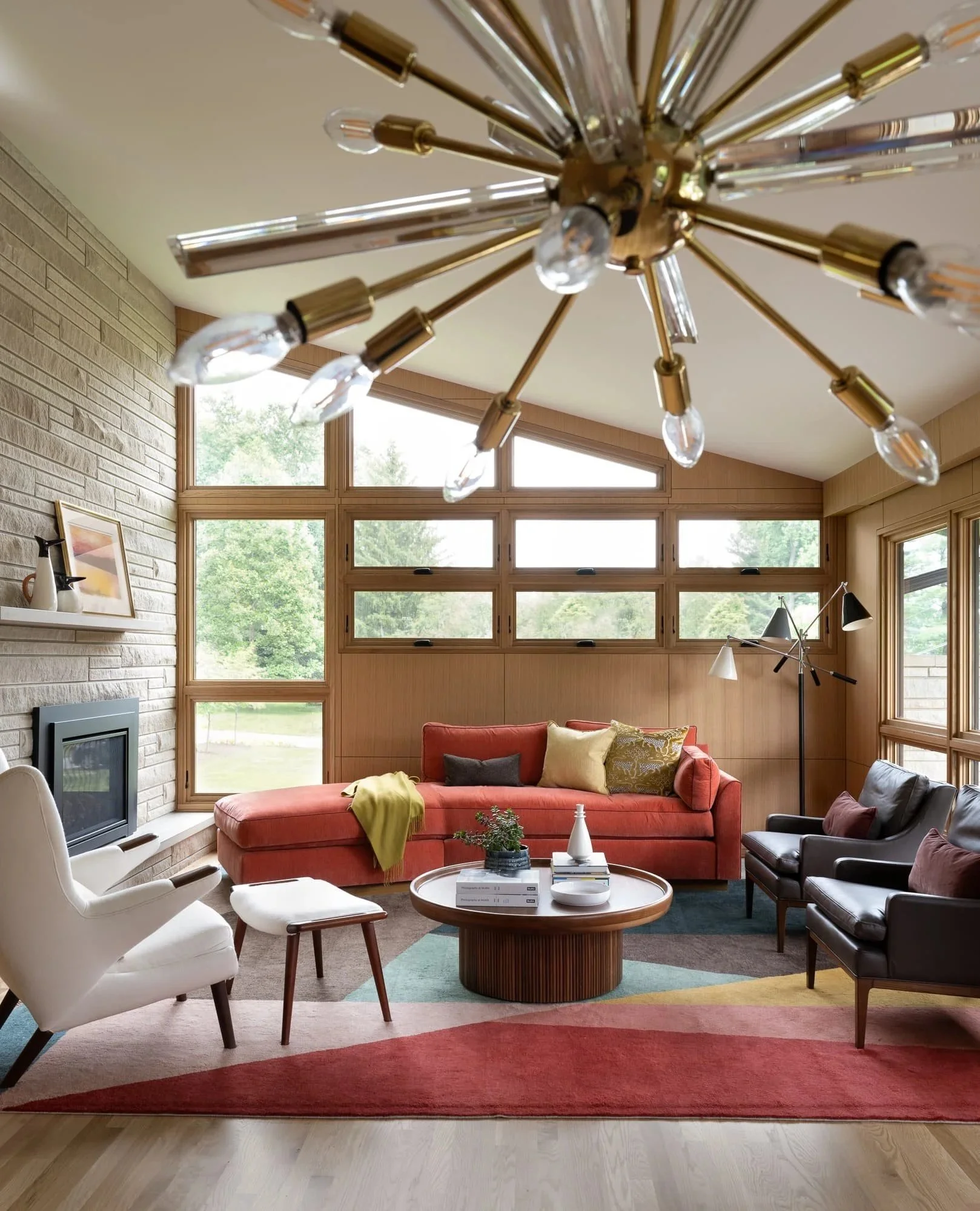 susan-yeley-homes-midcentury-modern-family-room-sputnik-chandelier-coral-sectional.jpg
