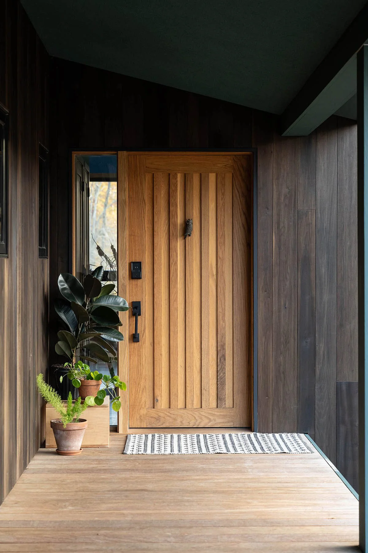 rainbow-in-the-woods-susan-yeley-exterior-front-door-mixed-woods.jpg