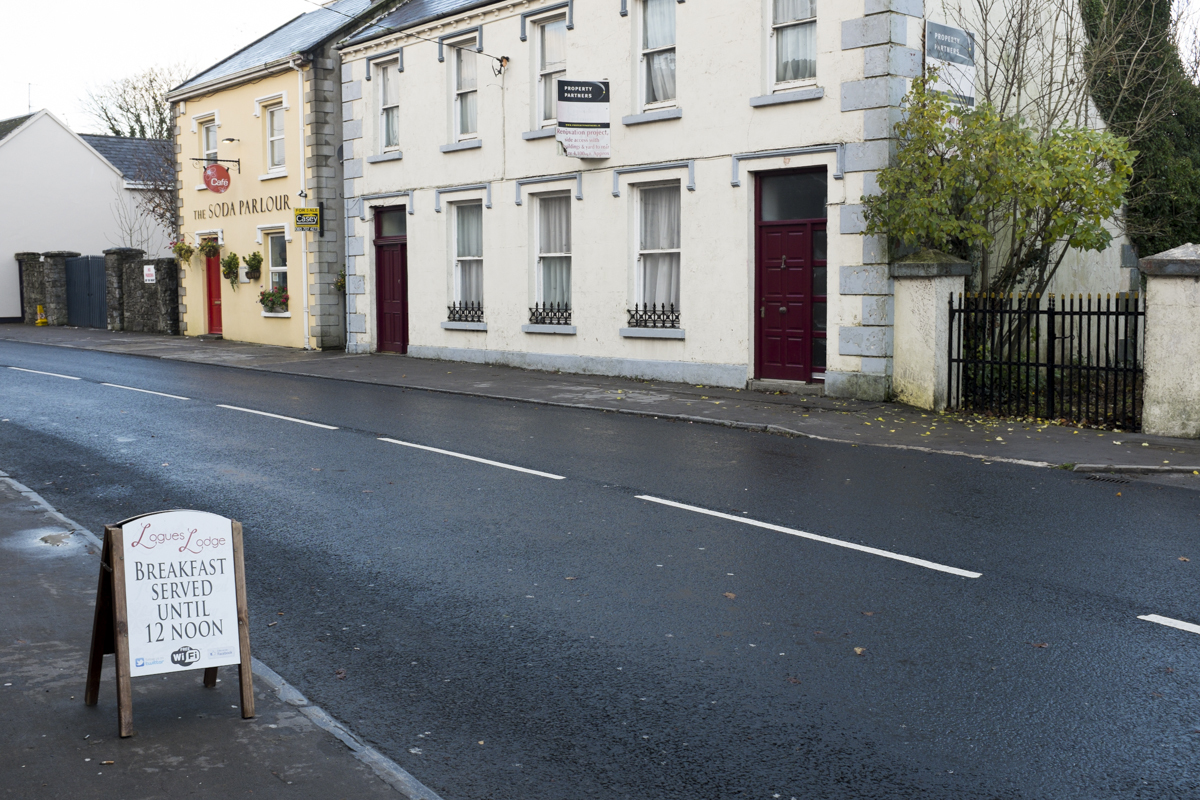 Picture of Logues sign offering breakfast, hotel not pictured.