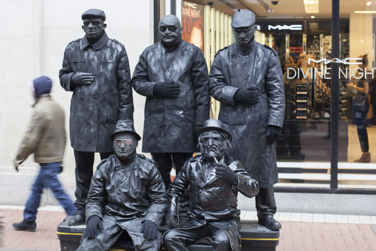 Street performers - not entirely sure what exactly they're performing other than a variant of blackface?