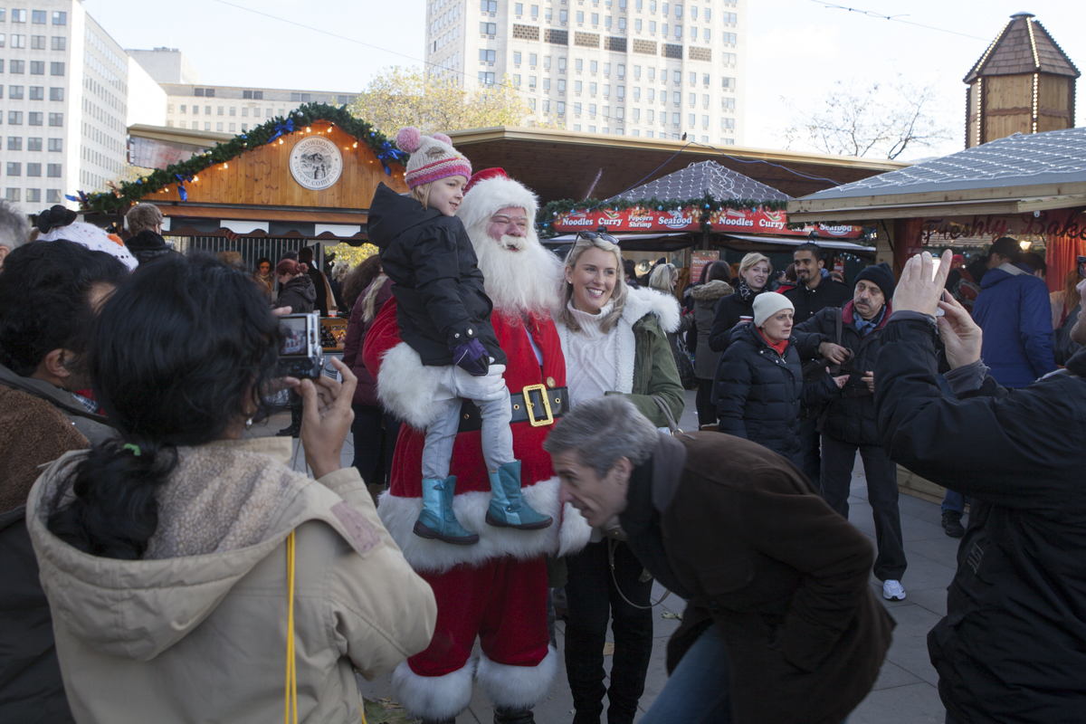 Further on there was a guy dressed as Santa getting his pic taken with the kiddies.